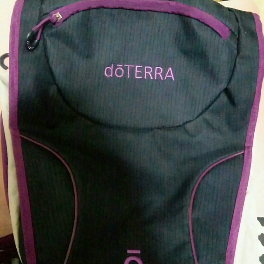 Doterra black and purple back pack